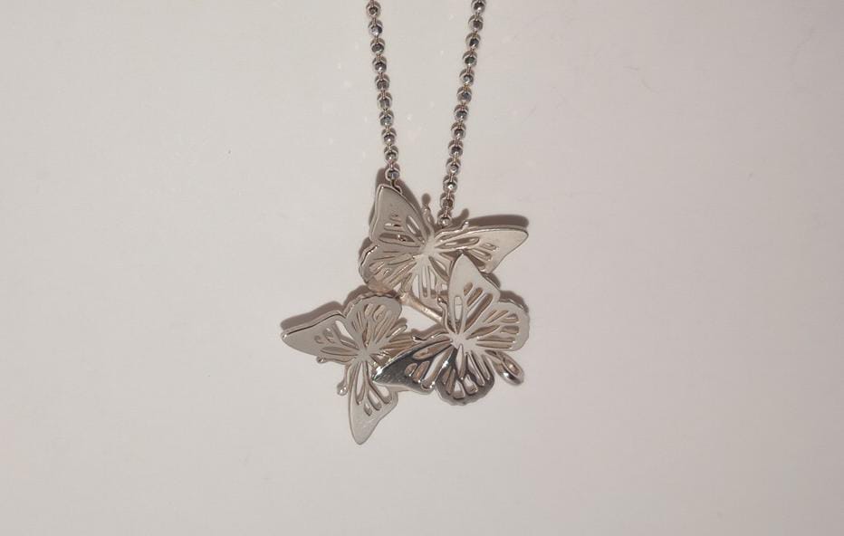 DIJE TRES MARIPOSAS